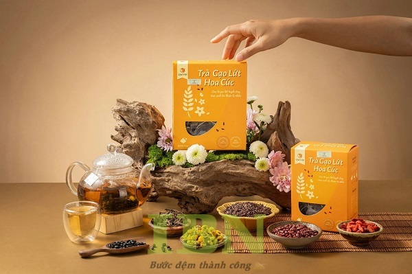 Mẫu hộp giấy đựng trà gạo lứt hoa cúc
