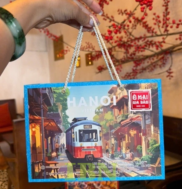 Mẫu hộp giấy ô mai có quai xách